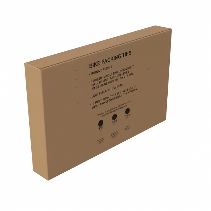 A brown cardboard bike box shown closed at an angle on a white background, with printed text reading &