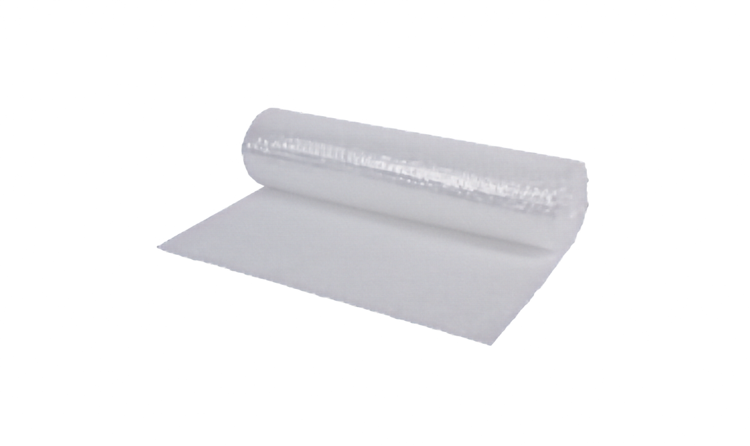 A roll of clear bubble wrap, partially unrolled to show its textured, transparent surface, set against a plain white background.