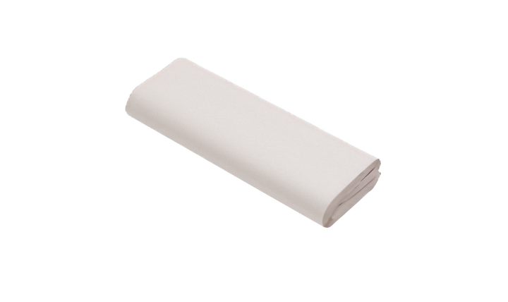 Bundled stack of white packing paper, not bundled with strapping. Pictured on a plain white background.