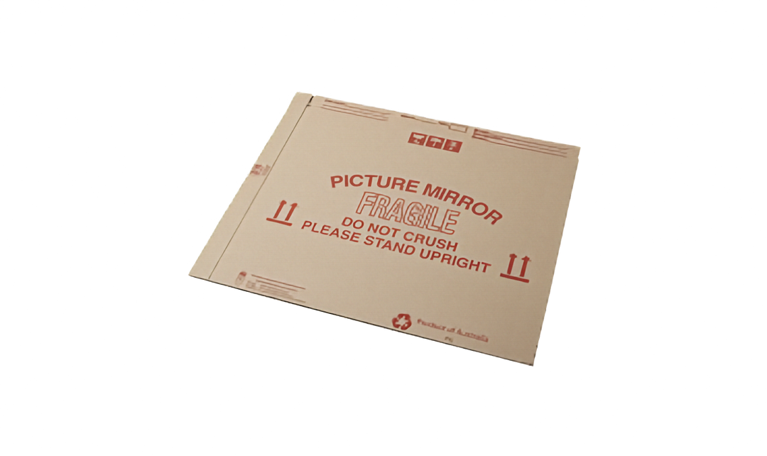 A flat packed brown cardboard picture frame box with red printed text reading &