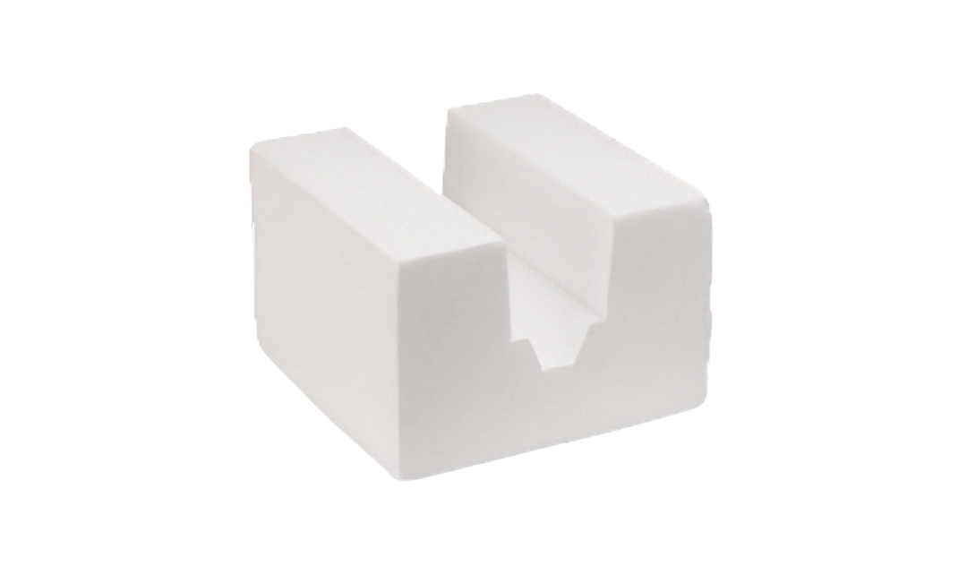 A white foam wedge support for tv boxes with a U-shaped notch, shown on a plain white background.